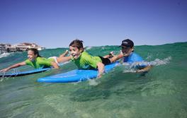 Kids surfing, Bondi Children learning to surf with 'Let's Go Surfing' at Bondi